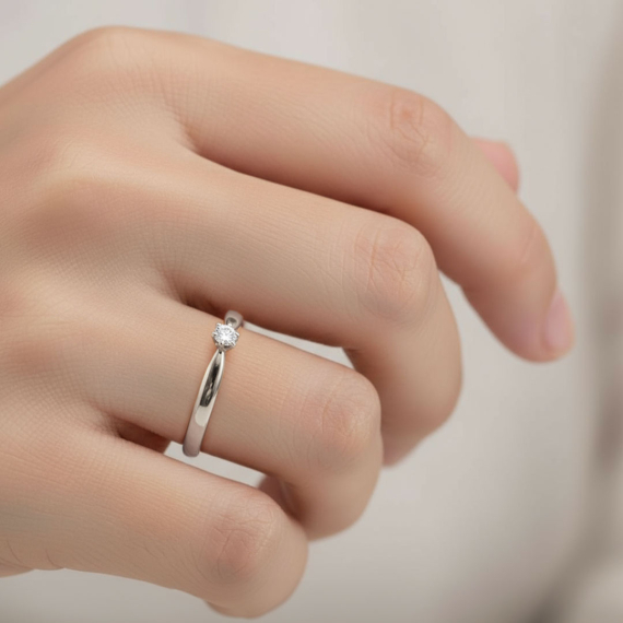 Pierścionek z białego złota z diamentem 0.1 ct - próba 585 Pierścionek z białego złota z diamentem 0.1 ct - próba 585