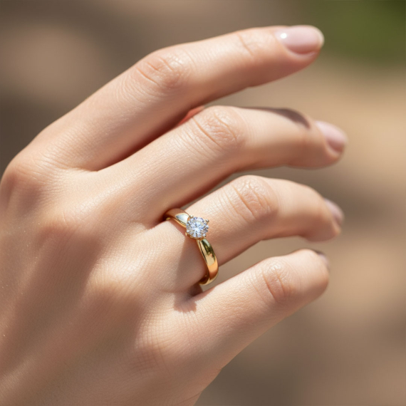 Ponadczasowy pierścionek z żółtego złota z diamentem 0.25 ct - próba 585 Ponadczasowy pierścionek z żółtego złota z diamentem 0.25 ct - próba 585