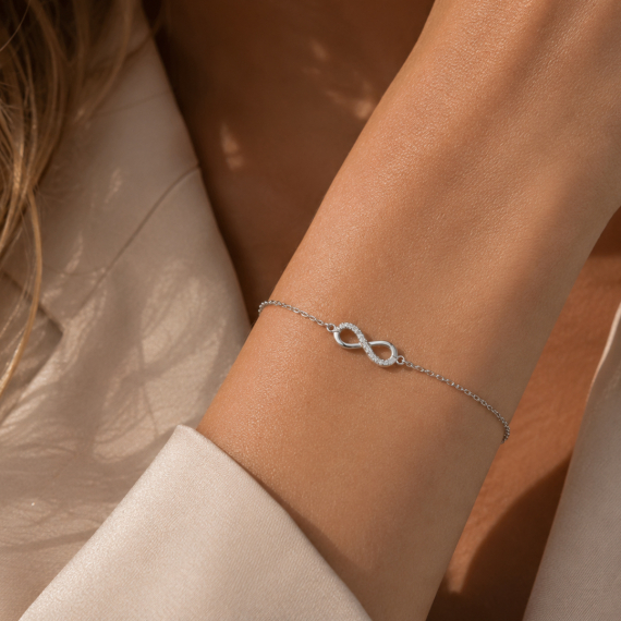 Bransoletka z białego złota z zawieszką Znak Nieskończoności z diamentami 0.05 ct - próba 585 Bransoletka z białego złota z zawieszką Znak Nieskończoności z diamentami 0.05 ct - próba 585