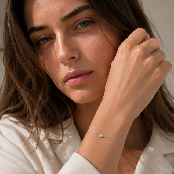 Bransoletka z białego złota z zawieszką serce z diamentami 0.09 ct - próba 585 Bransoletka z białego złota z zawieszką serce z diamentami 0.09 ct - próba 585