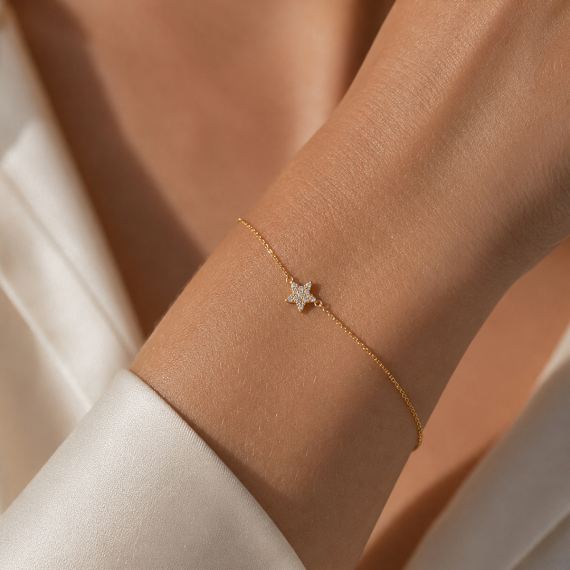 Złota bransoletka z zawieszką gwiazdy z diamentami 0.08 ct - próba 585 Złota bransoletka z zawieszką gwiazdy z diamentami 0.08 ct - próba 585