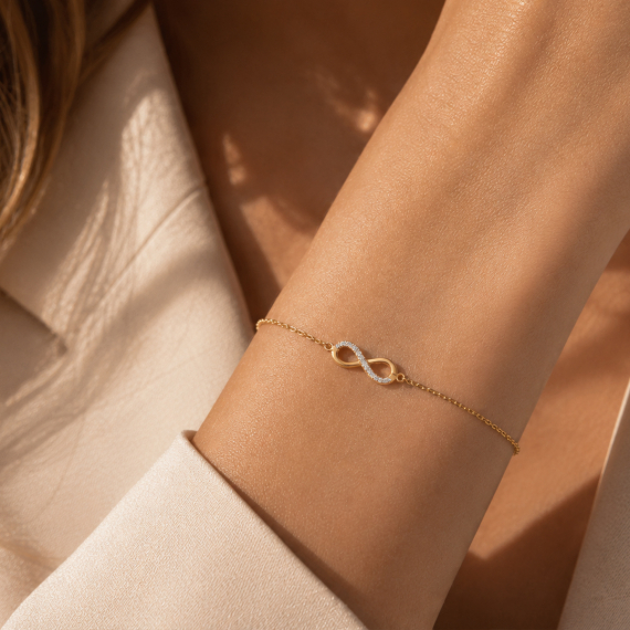 Złota bransoletka z zawieszką Znak Nieskończoności z diamentami 0.05 ct - próba 585 Złota bransoletka z zawieszką Znak Nieskończoności z diamentami 0.05 ct - próba 585