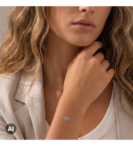 Bransoletka z zawieszką dwóch serc z białego złota z diamentami 0.08 ct - próba 585 Bransoletka z zawieszką dwóch serc z białego złota z diamentami 0.08 ct - próba 585