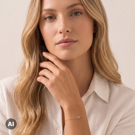Złota bransoletka z zawieszką dwóch serc z diamentami 0.08 ct - próba 585 Złota bransoletka z zawieszką dwóch serc z diamentami 0.08 ct - próba 585