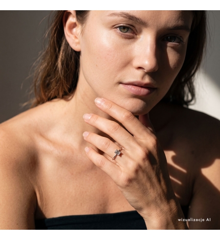 Pierścionek z białego złota z diamentem laboratoryjnym 1.5 ct o szlifie szmaragdowym - próba 585 Pierścionek z białego złota z diamentem laboratoryjnym 1.5 ct o szlifie szmaragdowym - próba 585