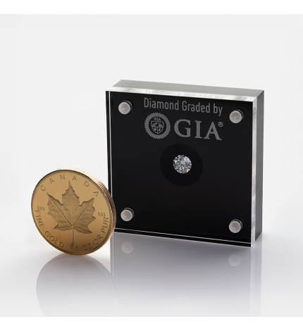 Zestaw złota moneta Kanadyjski Liść Klonowy 1 uncja i diament 0.75 ct Zestaw złota moneta Kanadyjski Liść Klonowy 1 uncja i diament 0.75 ct
